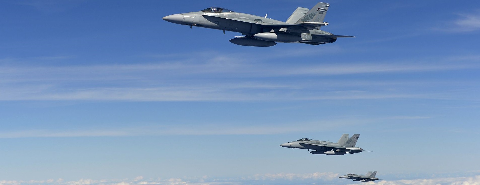 Three_RAAF_FA-18_Hornets_in_formation_after_refueling